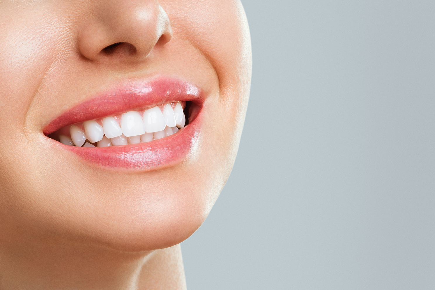 Perfect healthy teeth smile of a young woman